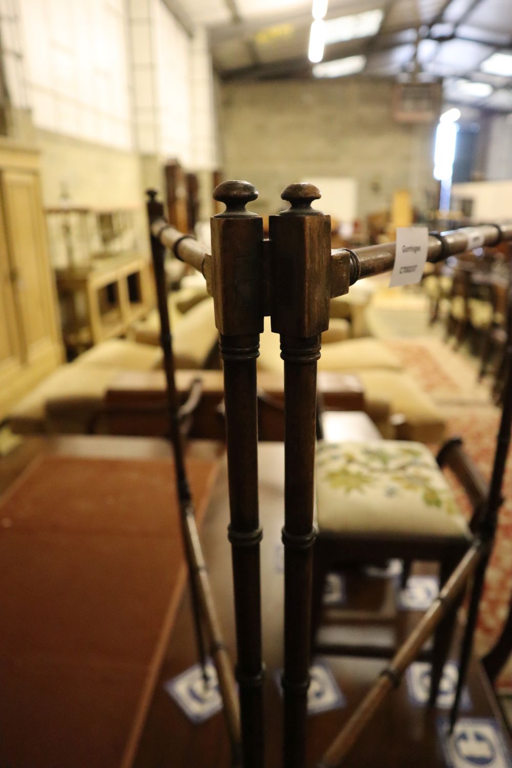 A 19th century turned mahogany folding towel rail, height 77cm